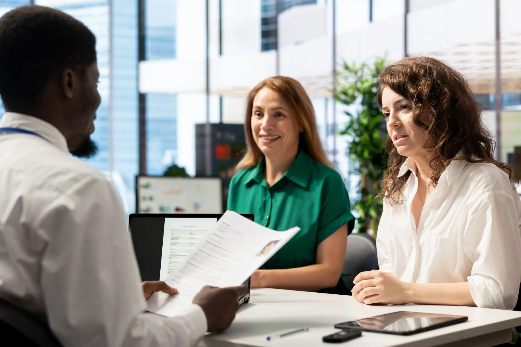 A recruiter conducting an employment verification call as part of a streamlined hiring workflow.